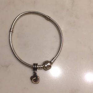 Real pandora bracelet with a heart charm